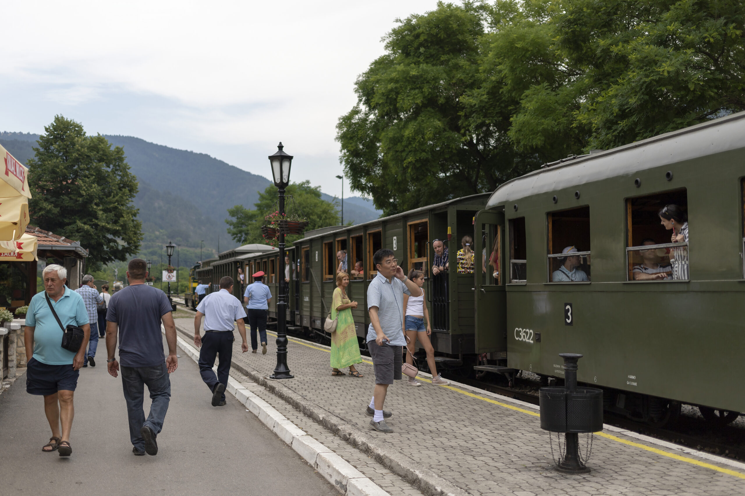 Passengers boarding a narrow gauge train at the station